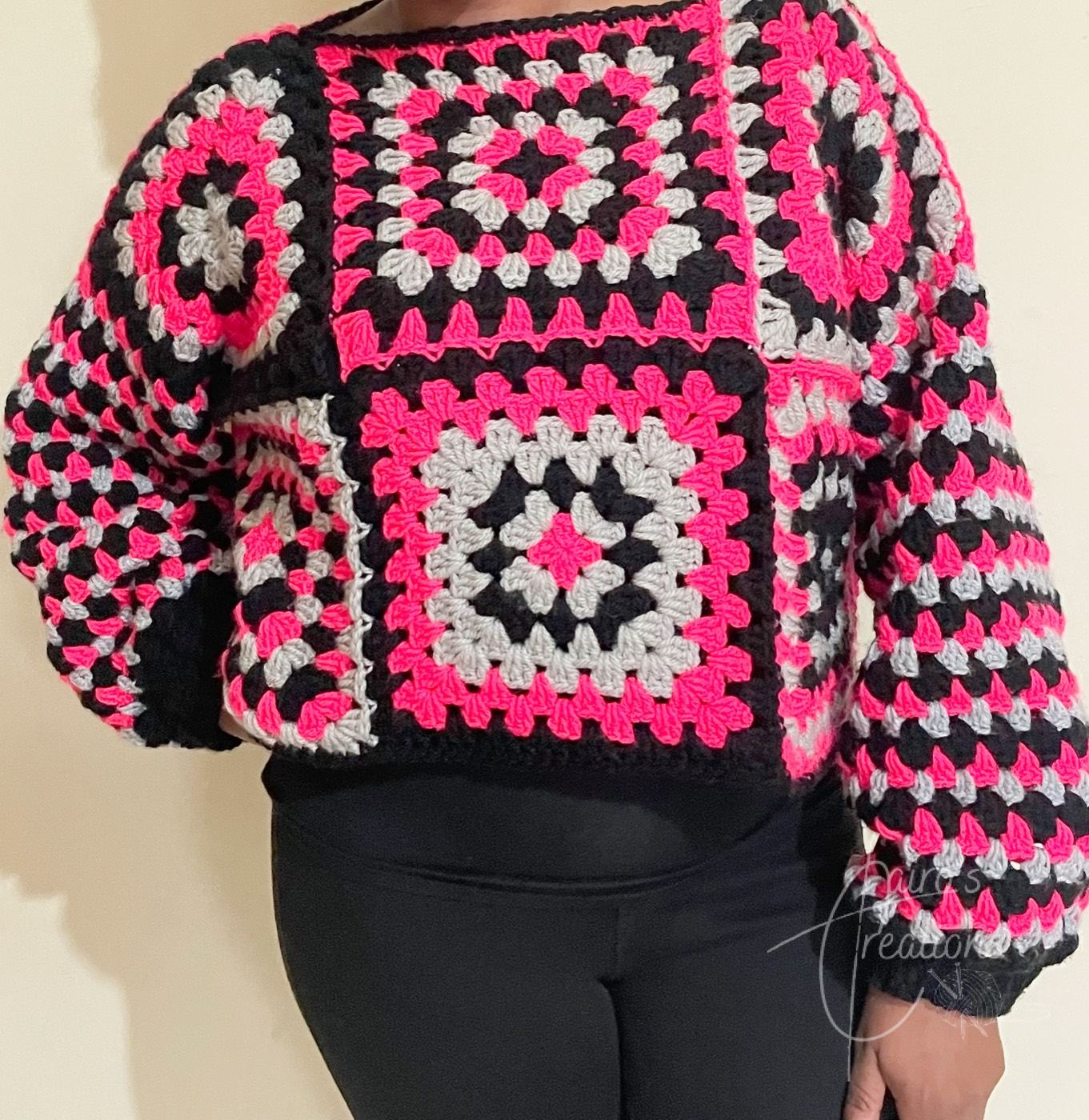 Hot pink, black and grey granny square crochet sweater, worn